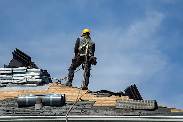 Professional Storm Damage Roof Repair technician working in Paterson, NJ